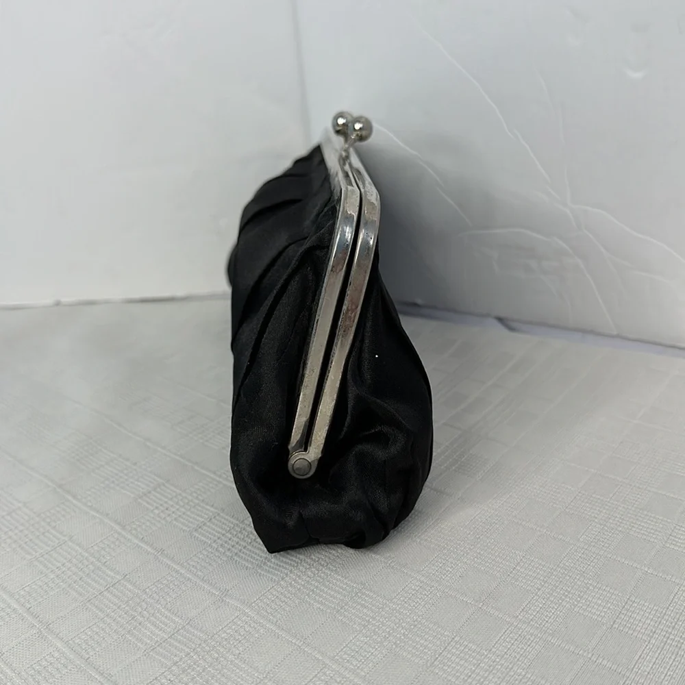 Carolina Herrera kiss lock black and silver clutch